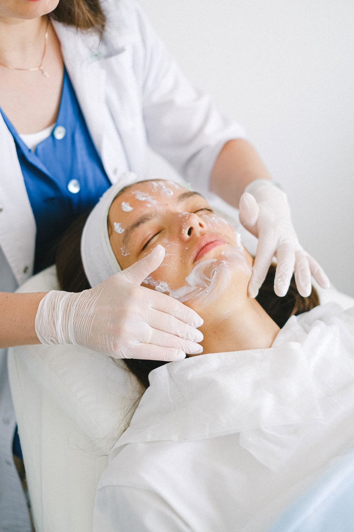 Fresh Esthetics esthetician applying a professional facial treatment